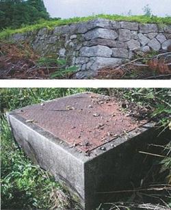 分校跡を示す石垣と井戸跡の画像