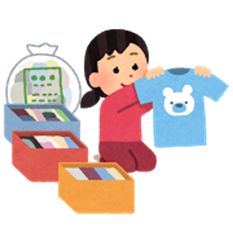 リサイクルに出す衣類を選んでいる様子のイメージ