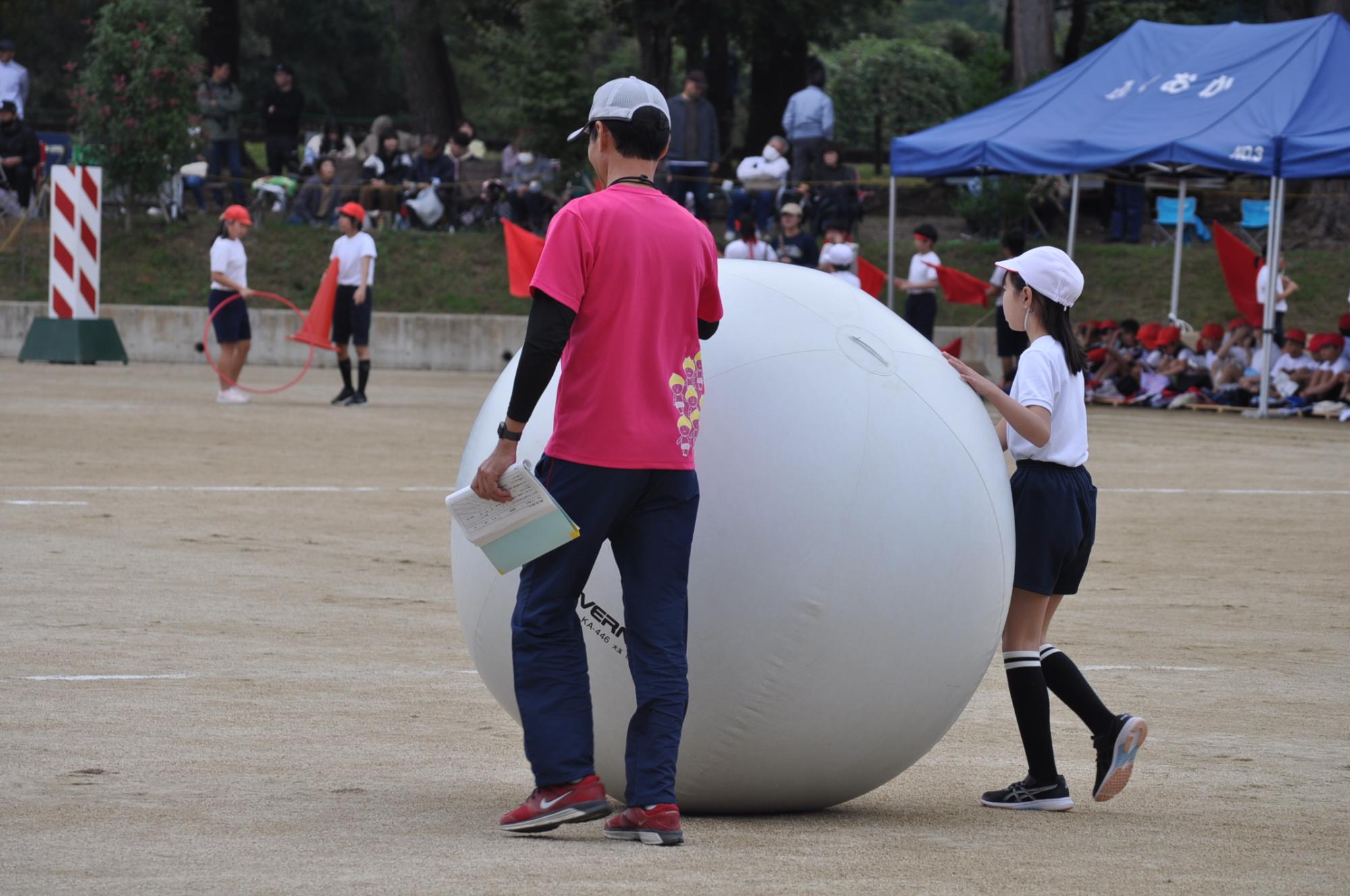 仕事をする器具係