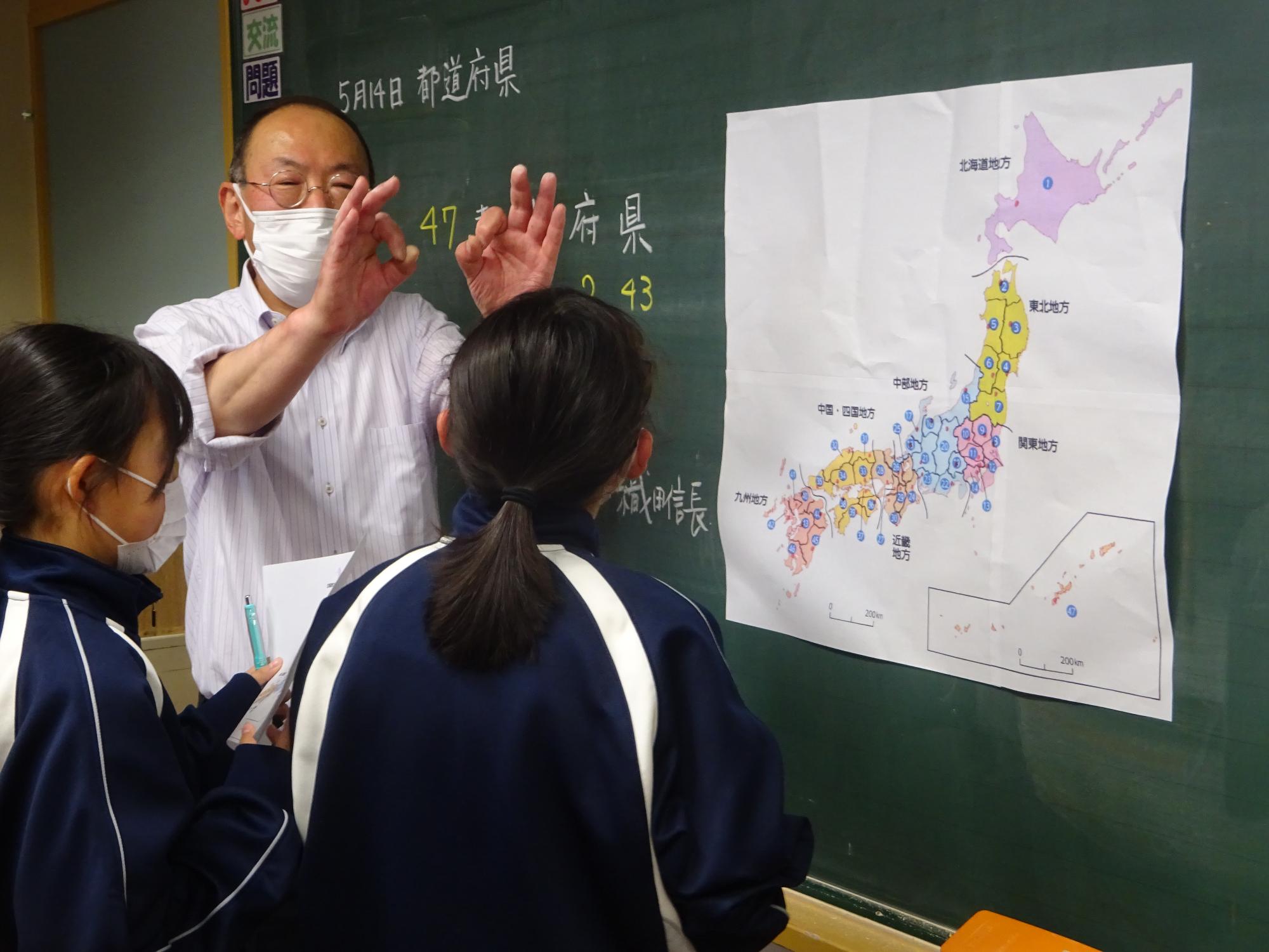 先生から合格をもらう生徒